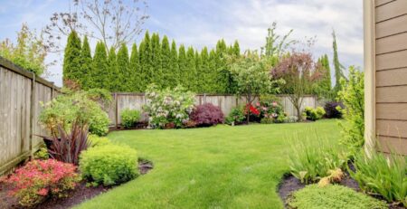 Well manicured, fenced in yard and garden.