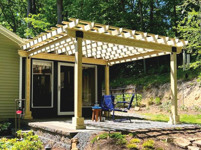 a pergola on a deck
