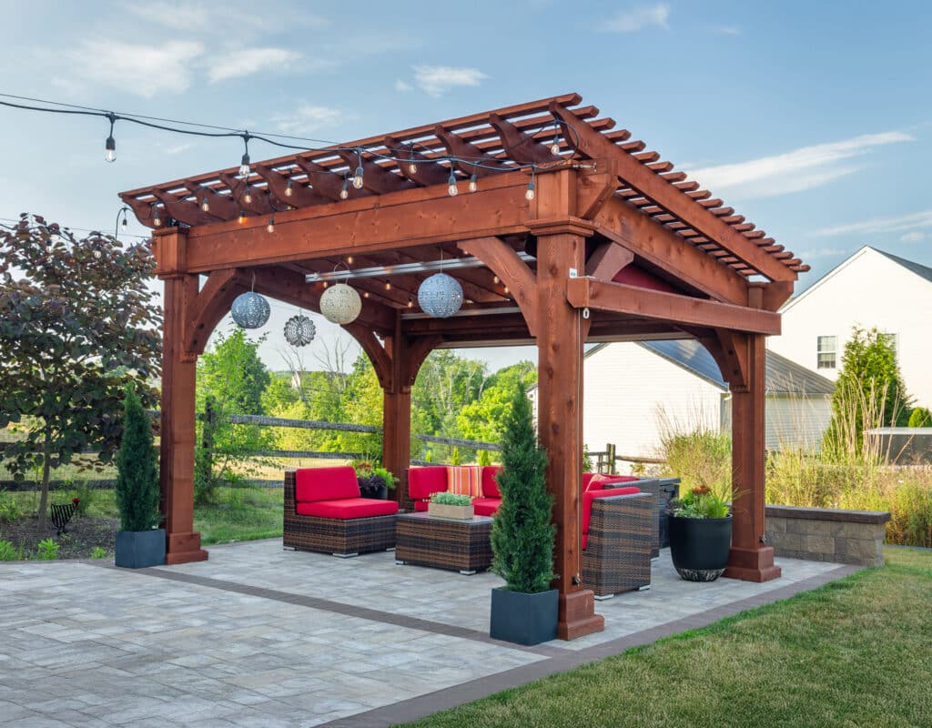 Photo of a 10' x 14' Santa Fe Pergola, Genuine Cedar, Canyon Brown Finish, EZ Shade Canopy & Curtain, Enhanced Posts, Electrical Package