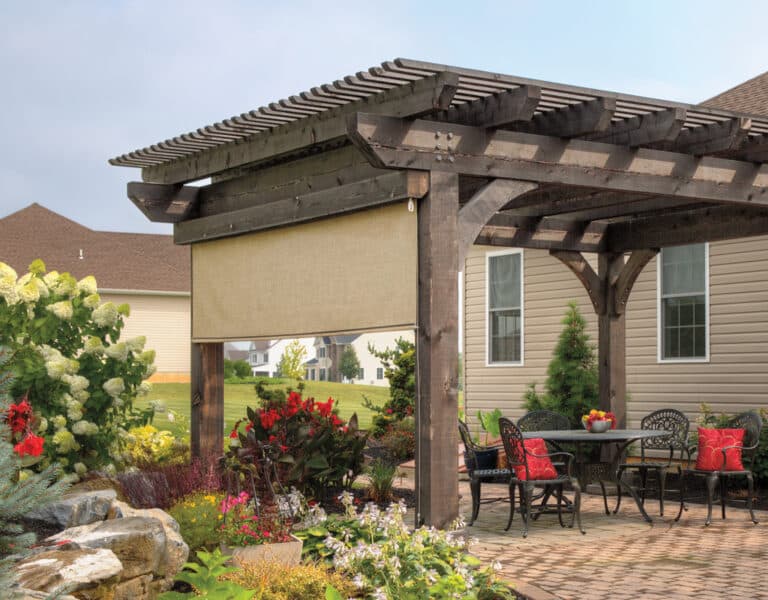 ez shade curtain photo a pergola with shade and patio with a table and chairs