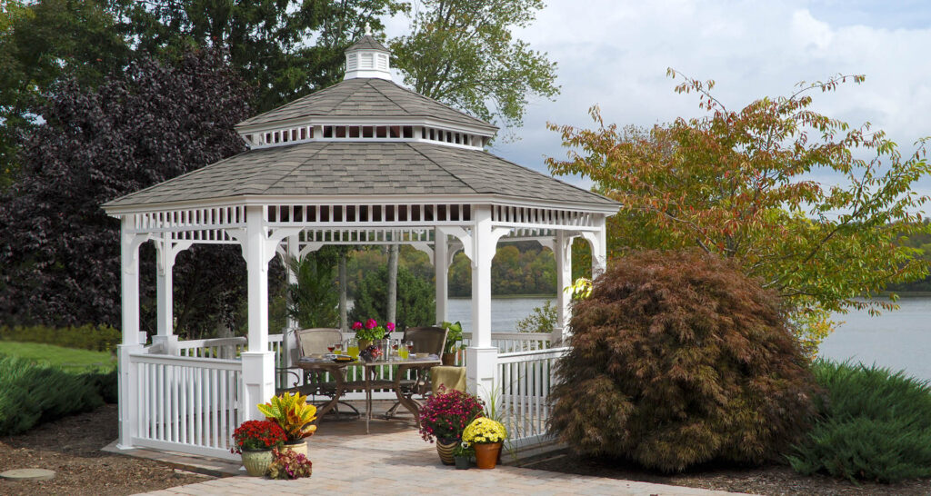 White vinyl gazebo on a lake.
